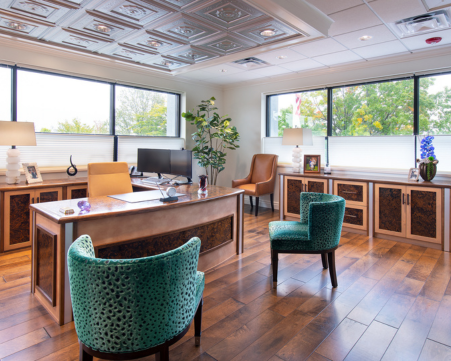 Stylish female CEO office designed by an interior designer, featuring modern furnishings, elegant decor, and a sophisticated color palette that blends professionalism with a touch of personal flair
