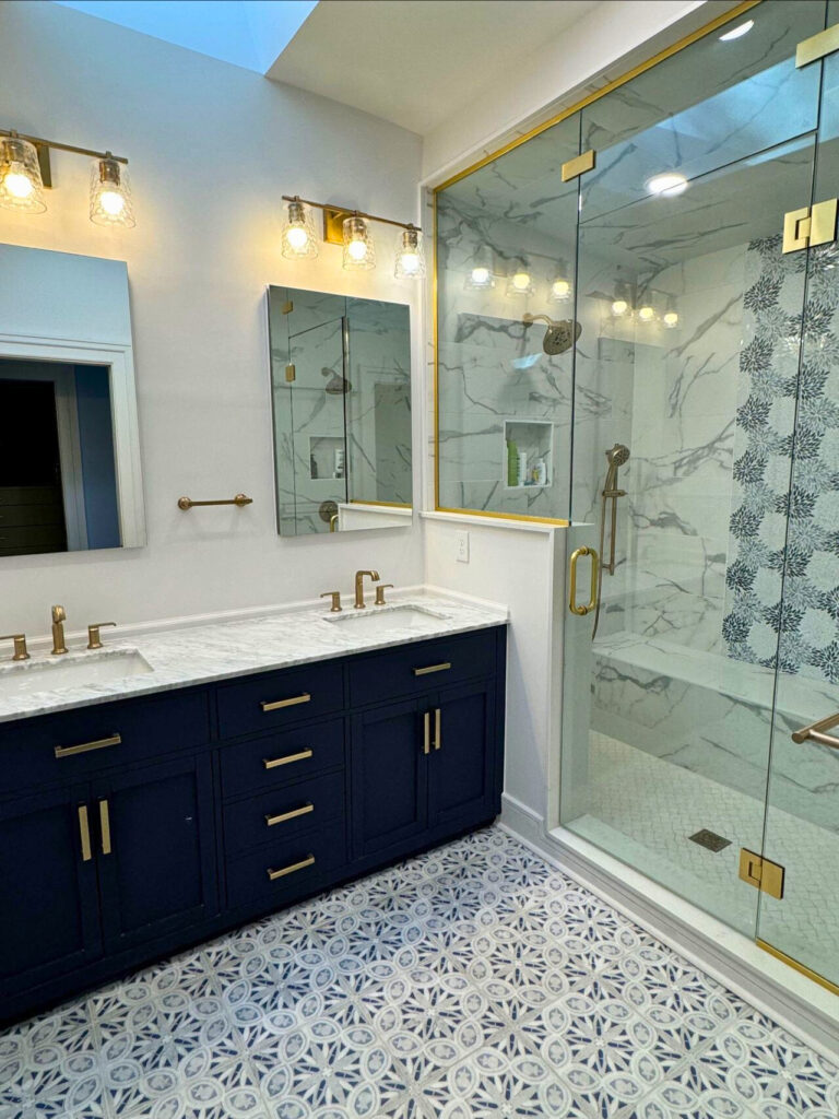 primary bathroom with statement blue mosaic tile